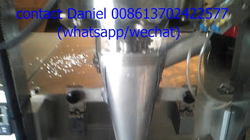 Vibration plate and measure cup feeding packing machine for granule 顆粒量杯震盤包裝機