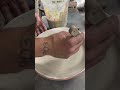 Glazing a stoneware plate. That sound is my button quail 😂 #clay #glaze #pottery #art #artist