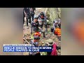 Search continues for 7 villagers trapped in a flooded cave in Laos