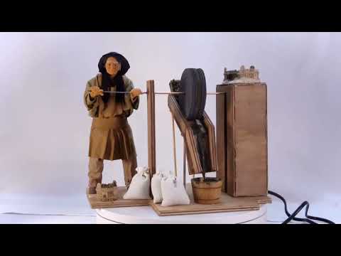 Man with olive mill 25 cm moving series video