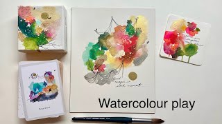 Painting abstract watercolour backgrounds.