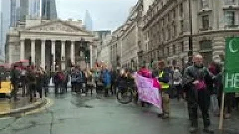 Environmental activists protest in London's financial district