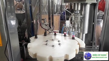 MÁY CHIẾT RÓT - VIỀN NẮP CHAI TỰ ĐỘNG ĐIỆN CƠ XANH