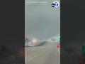 Tornado passed over highway while cars passing