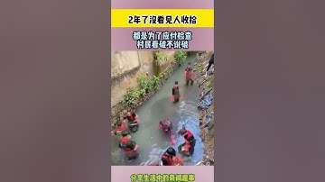 In China, workers clean up a small river filled with garbage