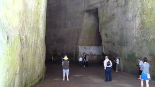 Woman Singing in Cave