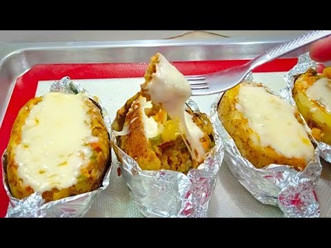 فيديو: طريقة طهي البطاطس المخبوزة بالقشدة والجبن