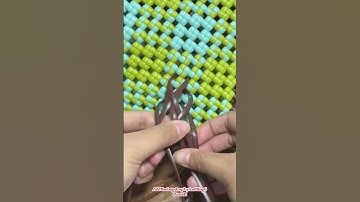 Add the bag strap by knitting 6 strands