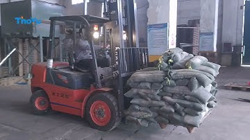 Load test of press wood pallet with raw materials of palm tree leaves