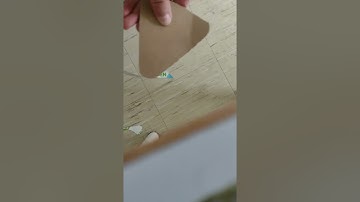 Reverse video: Making a heater shield out of cardboard.