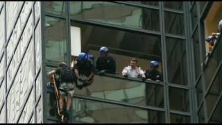 Video: NYPD grab Trump Tower climber(Police in New York City were forced to take down windows in order to grab a person climbing Trump Tower. Watch how the final minutes unfolded., 2016-08-11T01:08:29.000Z)