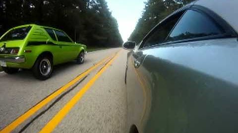 Mercedes SL500 VS. AMC Gremlin