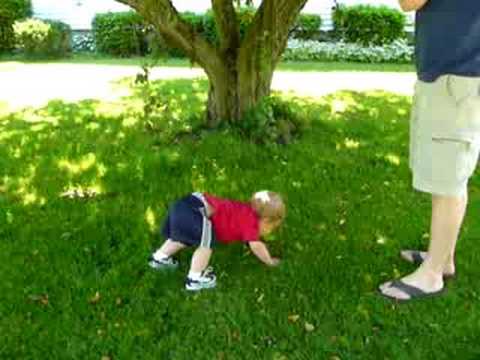 Toddler plays outside (until diaper load ends the fun)