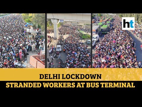 Amid lockdown, migrant workers swamp Delhi bus terminal, desperate to go home