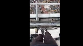 Parkour Guy Jumping On The Edge Of High Building