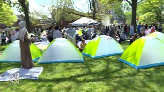 Rutgers students rally, set up encampment