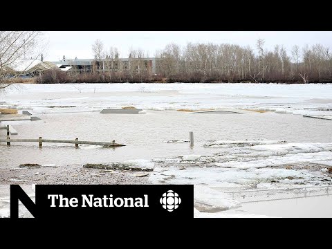 Fort McMurray flooding forces evacuation, call for military assistance