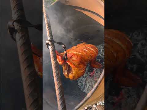 پخت مرغ شکم پر داخل بشکه