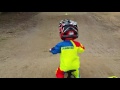 Two year old mini wheeler on bmx track.