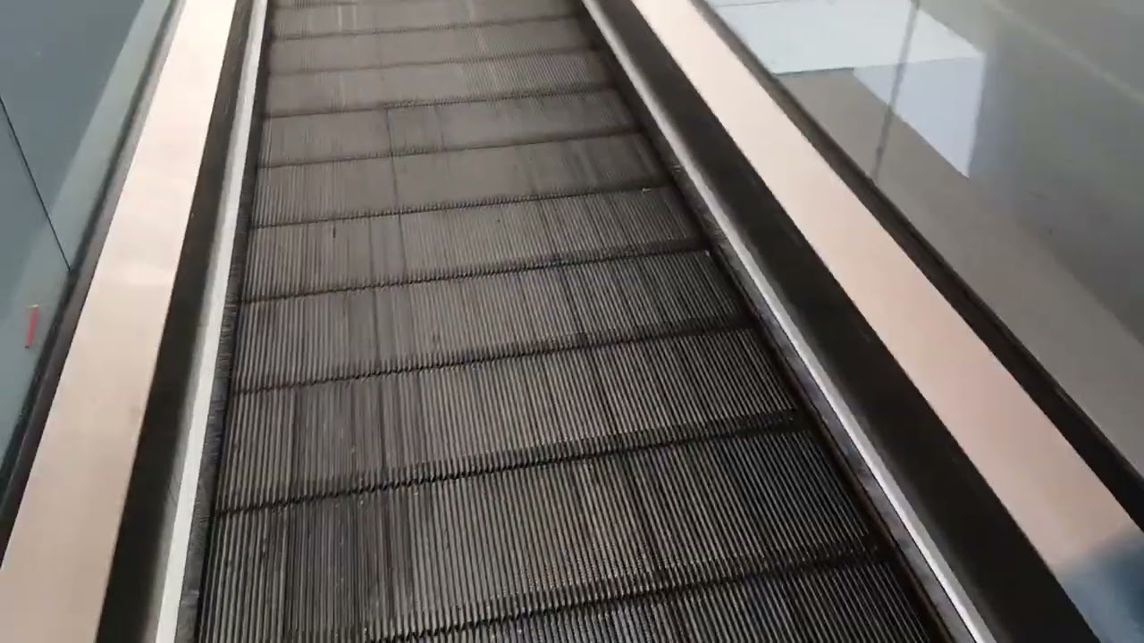 Moving walkway  at Jumbo market in Hutzot Hamiftats shopping center in Haifa