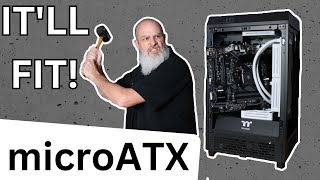 Can a microATX MB fit the Tower 200 case?? I took a swing at it!