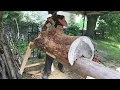 Chainsaw carving a bear sleeping on a log part 1