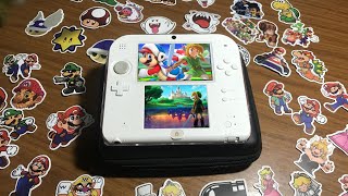 Куча наклеек от Nintendo + аксессуары для 2DS и 64GB карта памяти