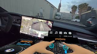 EL SHRAUGER VR DJing From TRIBExr using a Pioneer V10 and CDJ’s in a self driving 2023 Tesla Model S