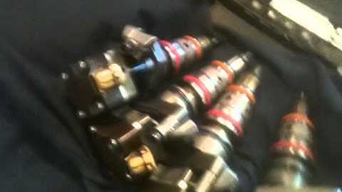 7.3L Diesel , install new Injectors  seals and bass cups