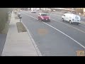 Another vehicle passes school bus letting off a child