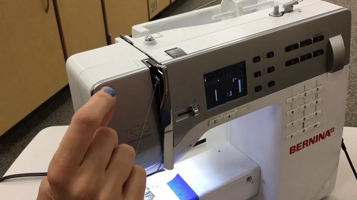 Threading the top thread of a machine