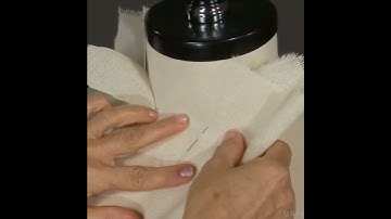 Draping a front bodice with a center front neck dart and a jewel neckline