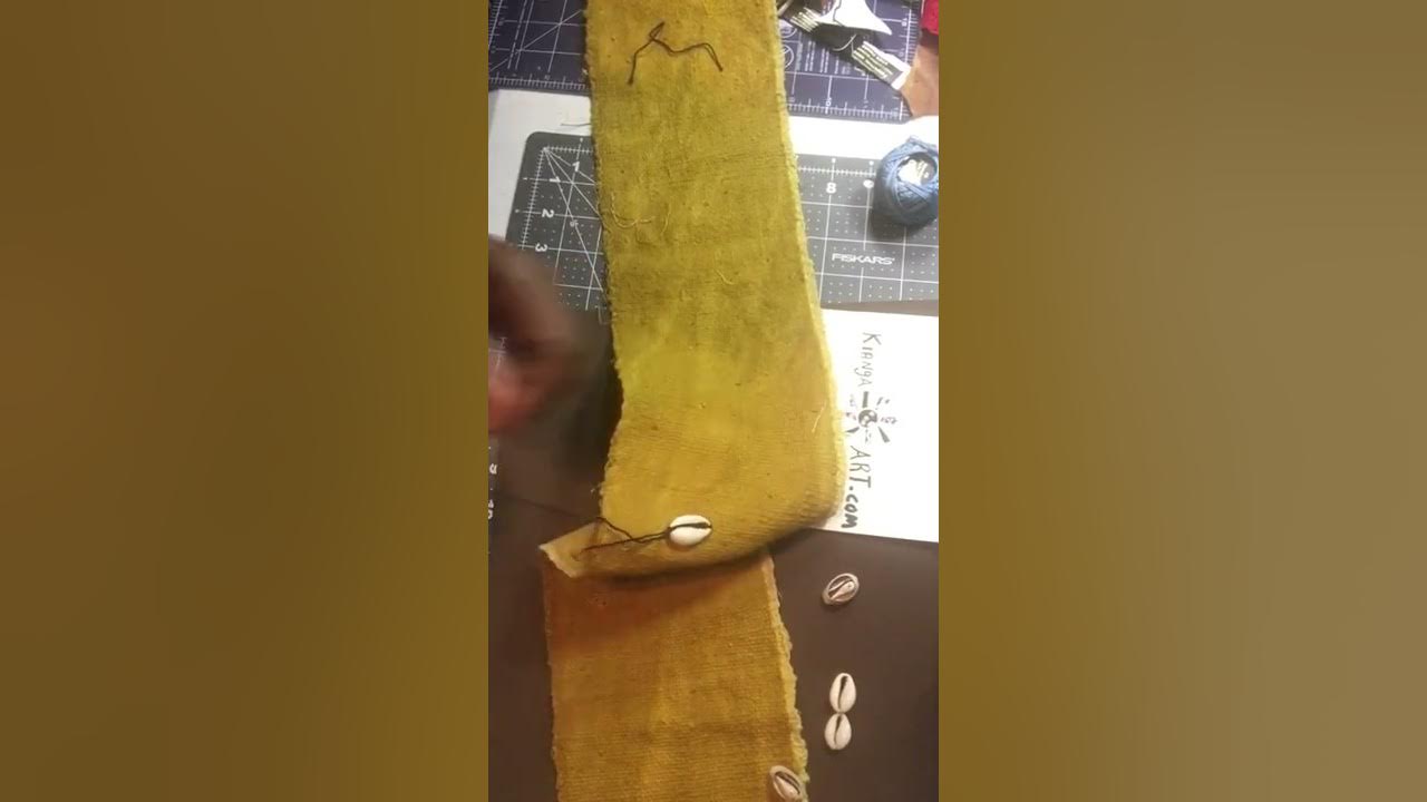How to sew cowrie shells on fabric YouTube