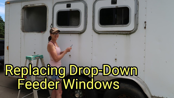 Horse trailer drop down window latch