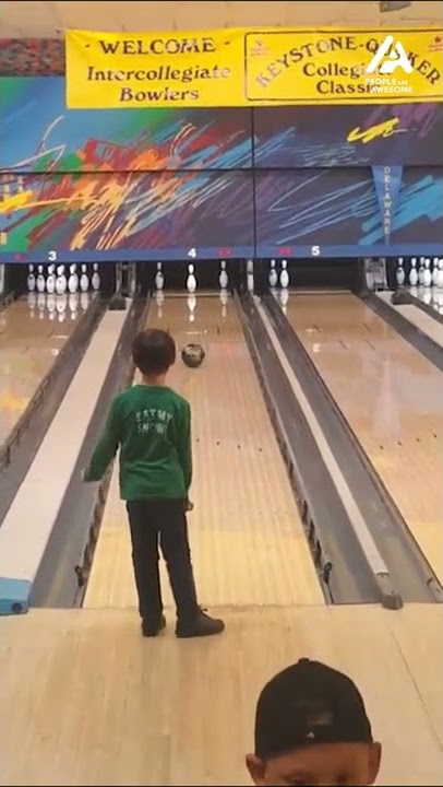 Kid makes impossible bowling trick shot look easy!
