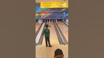 Kid makes impossible bowling trick shot look easy!