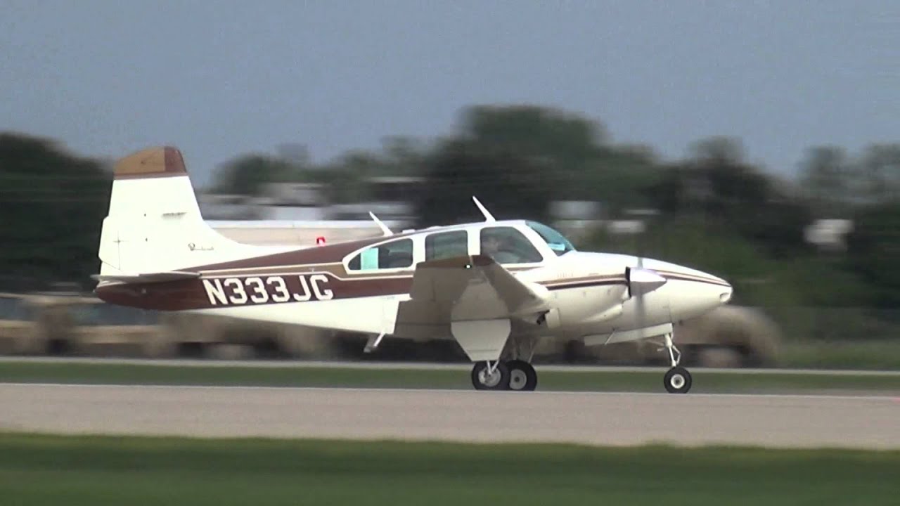 Beech Travel Air, N333JG departing KOSH 20140804052839 1 1