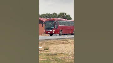 A RED BUS DRIVER ON THE ROAD #redbus #busvideo #trucking #busdriver #automobile #road #heavytruck