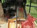 Antique tractor powered corn mill