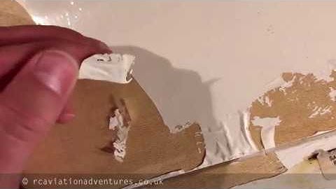 Iron on heat shrink film removal tip