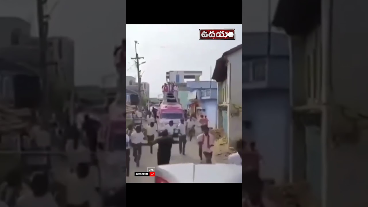 Telangana Minister KTR KTR Fall Down From Campaign Vehicle In Armoor. 