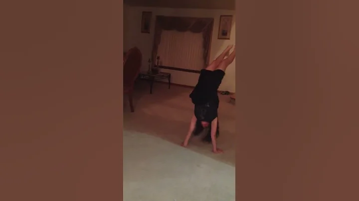 Briannah doing hand stand