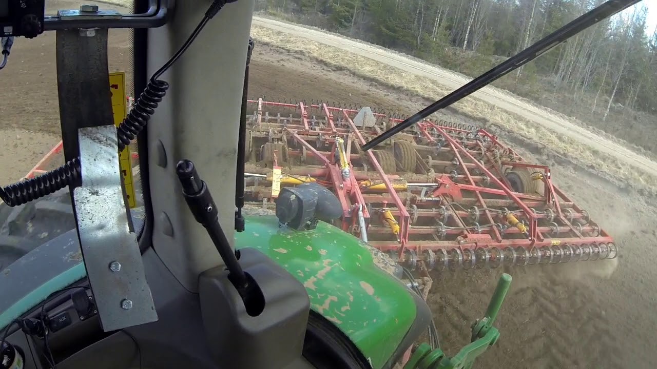 JD7280R and Potila Master harrow