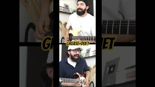 Guitar Duet: John Travolta + Olivia Newton-John
