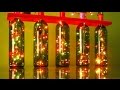 Las luces de Navidad utilizando botellas de vino recicladas