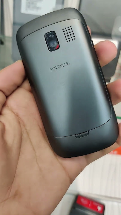 #Nokia Asha 302 with original box, charger and h free available at AA MOBILES HAFIZABAD Only 10000=/