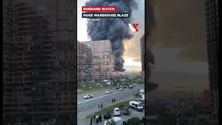 People Watch Wildberries Burn | Ukraine Drone Strike Sparks Massive Fire Near St Petersburg | VERTEX