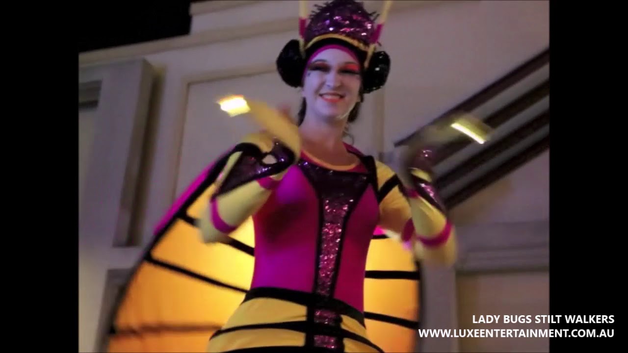 Lady Bugs Stilt Walkers