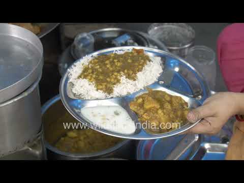 Customers have a meal at Devendra Tea Stall in Hauz Khas