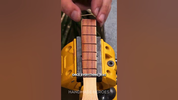 Transform a coconut shell into a rockin’ DIY ukulele! 🥥🎸